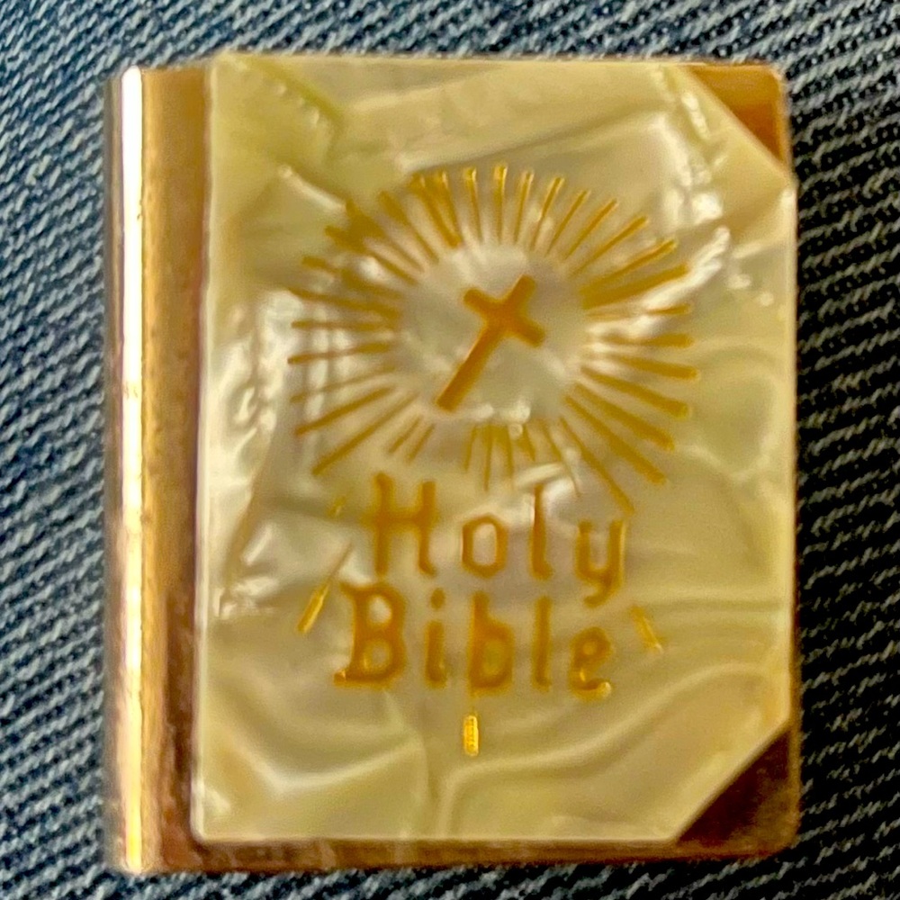 very tiny Bible in mother of pearl case/locket. 1940s